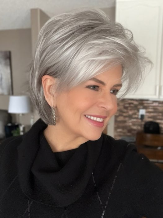 Donna @style.me.ageless wearing SKY by NORIKO in color SILVER STONE | Silver Medium Brown blend that transitions to more Silver then Medium Brown then to Silver Bangs