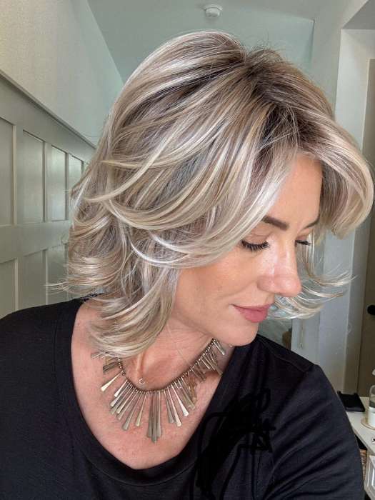 Jenny @thewiggygirl wearing CROWD PLEASER by RAQUEL WELCH in color RL19/23SS SHADED BISCUIT | Light Ash Blonde Evenly Blended with Cool Platinum Blonde and Dark Roots