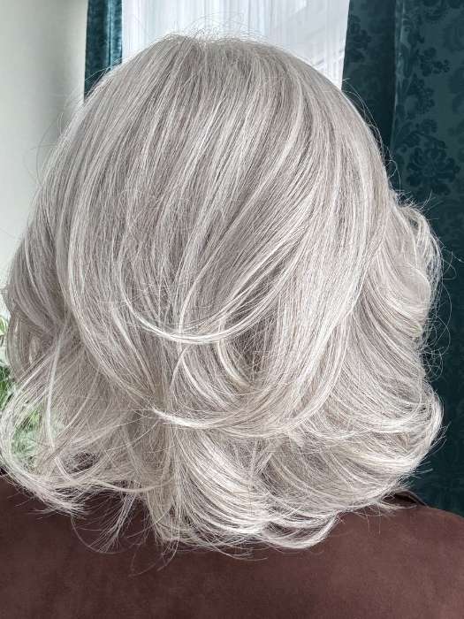 Mel B. @mels.be.ageless wearing CROWD PLEASER by RAQUEL WELCH WIGS in color RL56/60 SILVER MIST | Lightest Gray Evenly Blended with Pure White
